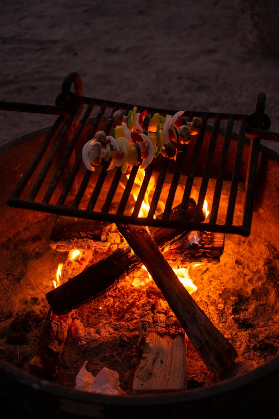 Food cooking over a campfire